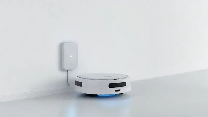 Render 3D de um robô aspirador voltando sozinho para sua base de carregamento, ilustrando o conceito de autonomia de bateria.