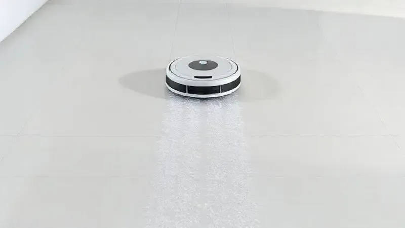 Render artístico mostrando a dupla função de um robô aspirador, que aspira a poeira e passa pano úmido simultaneamente no piso.