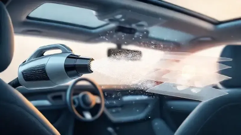 Ilustração conceitual do sistema de filtragem de um aspirador portátil, mostrando a captura de poeira e a purificação do ar dentro de um carro.